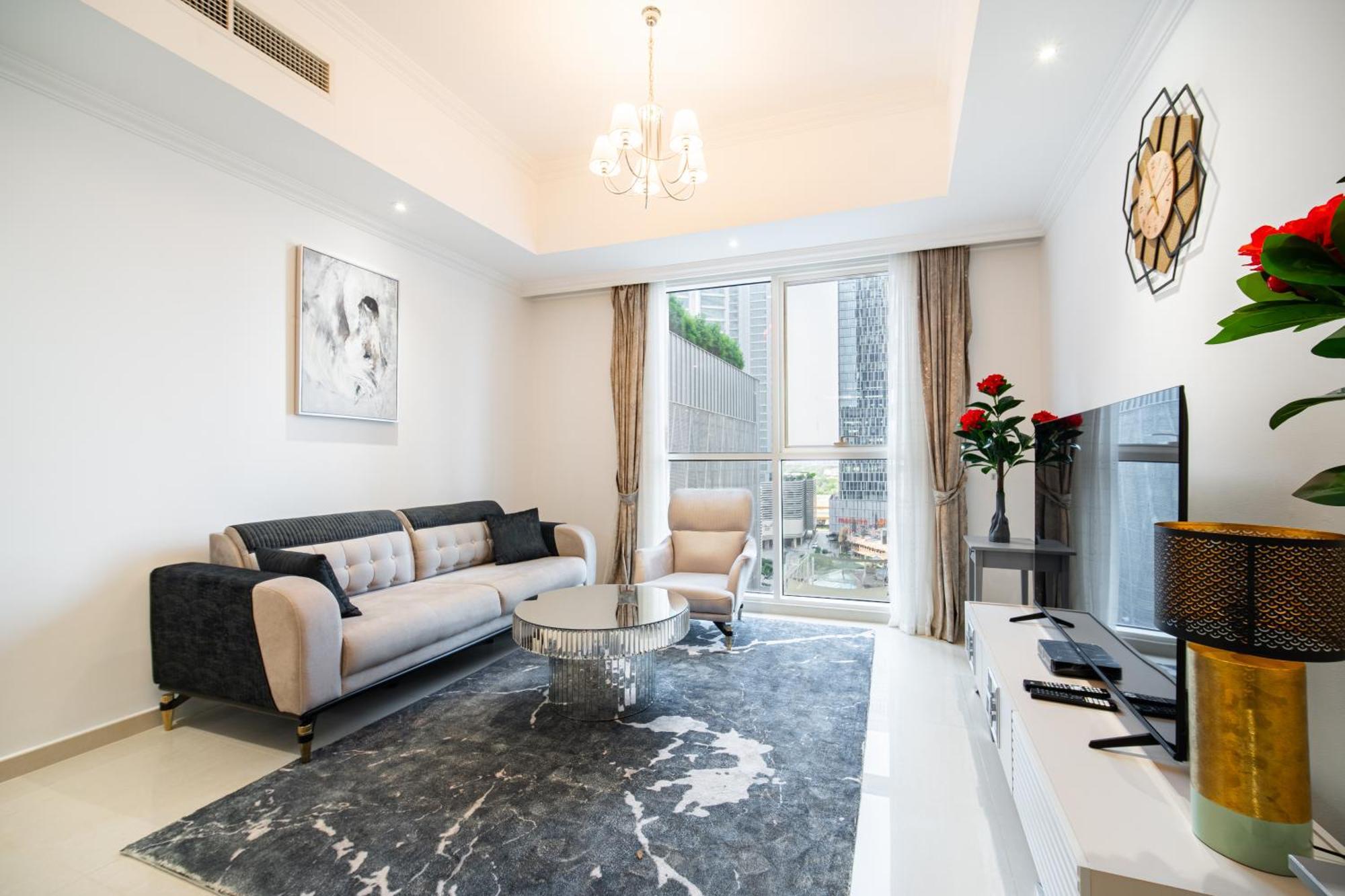 Apartment Elegant Escapes - Homely 1b In Dunya Tower Dubai