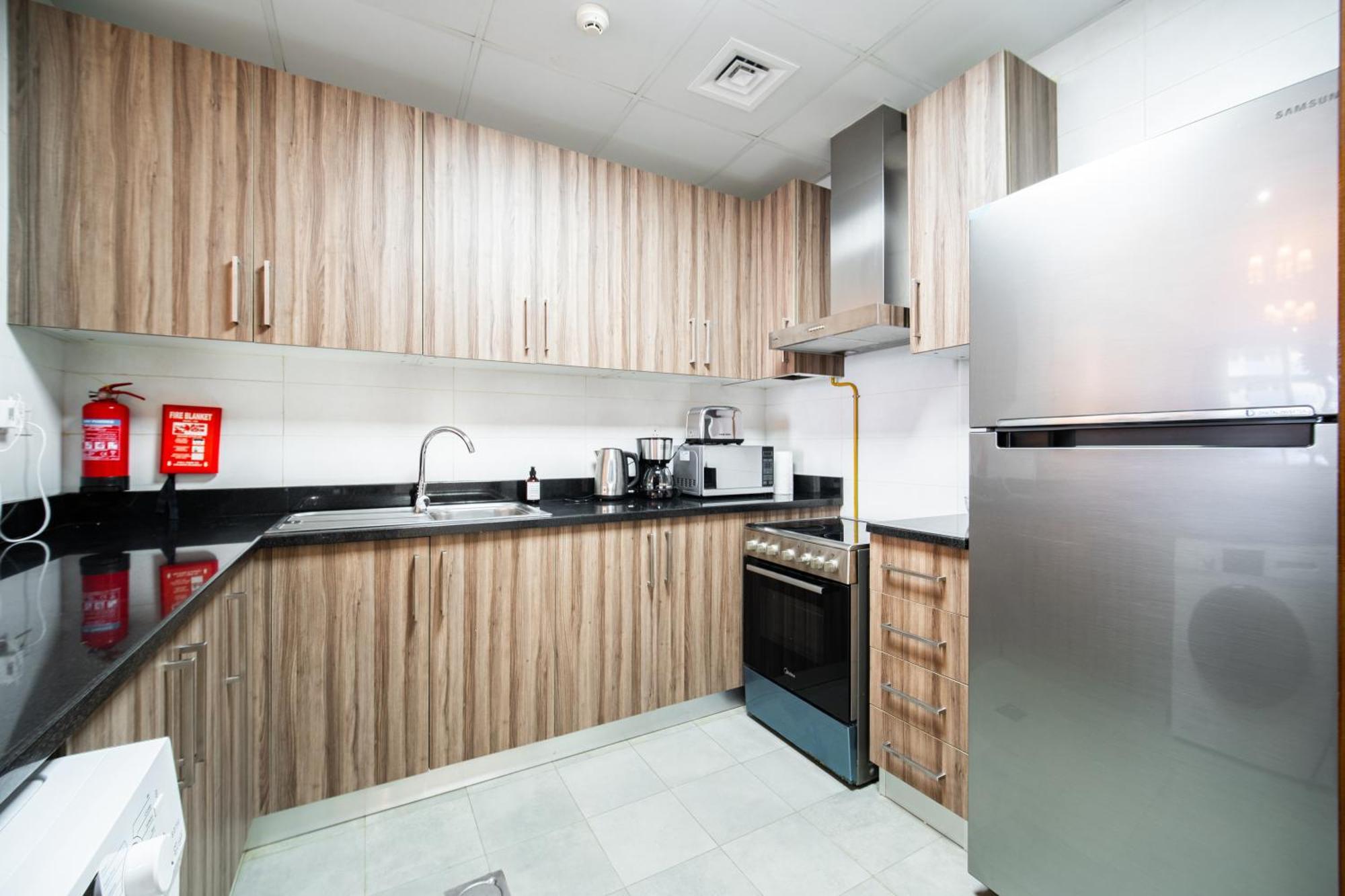 Elegant Escapes - Homely 1b In Dunya Tower Apartment *