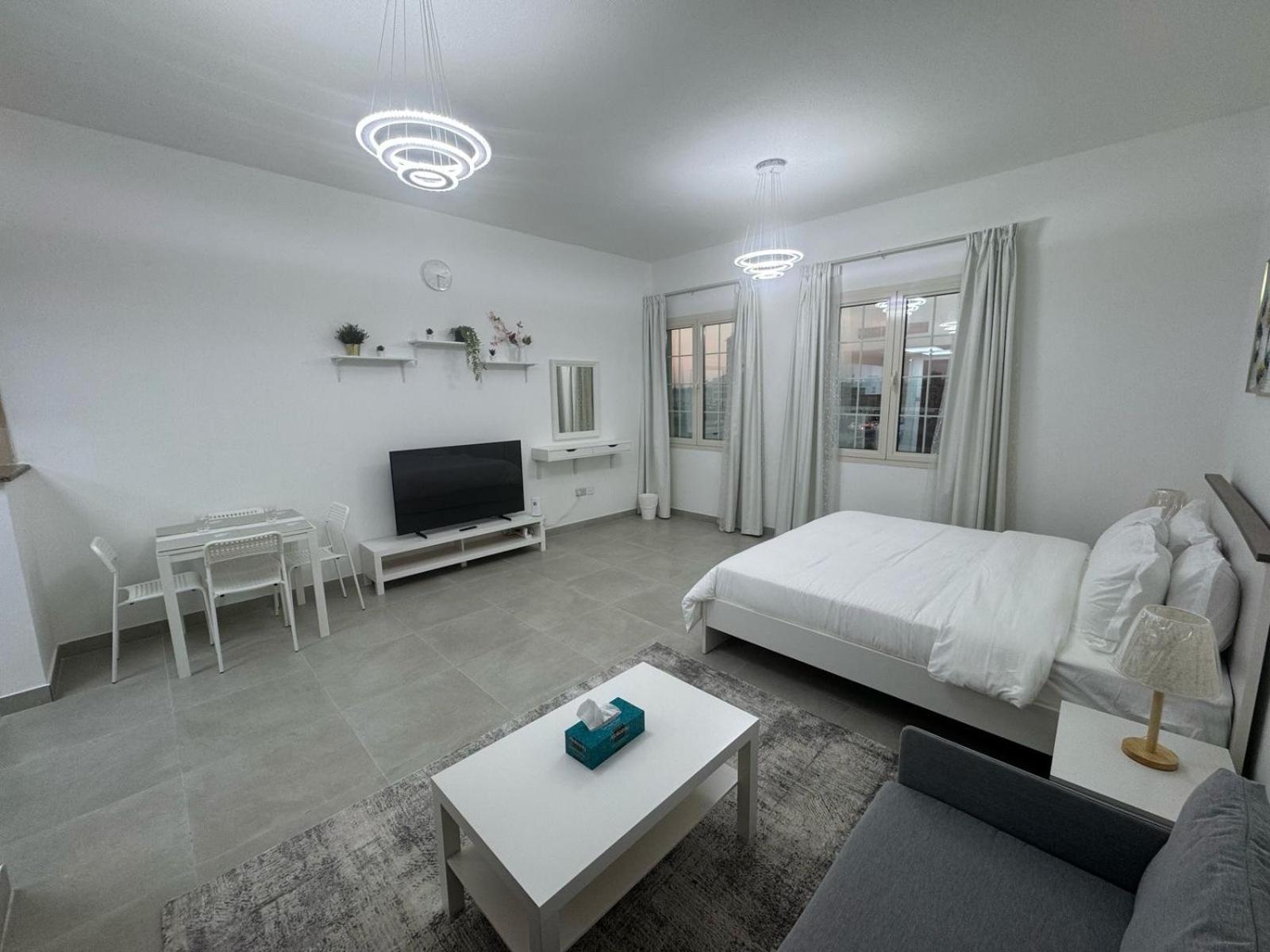 England Cluster International - Bright,spacious And Well Furnished Apartment Dubai