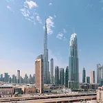 Maxstays - Stunning Burj Khalifa View - Dubai Mall Access - Infinity Pool