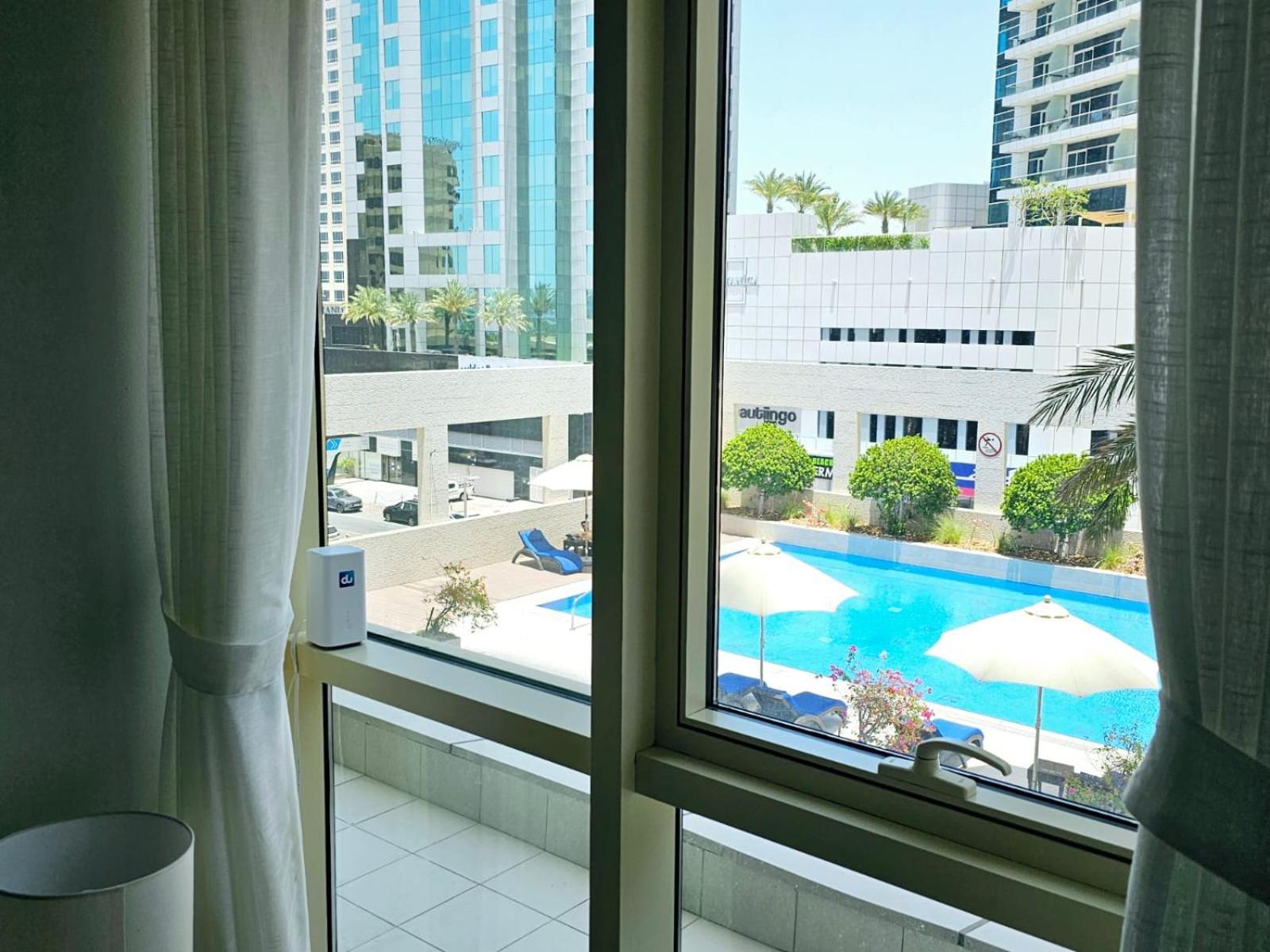 Apartment Sunrise Homes - Poolside 1 Bedroom Near Jbr