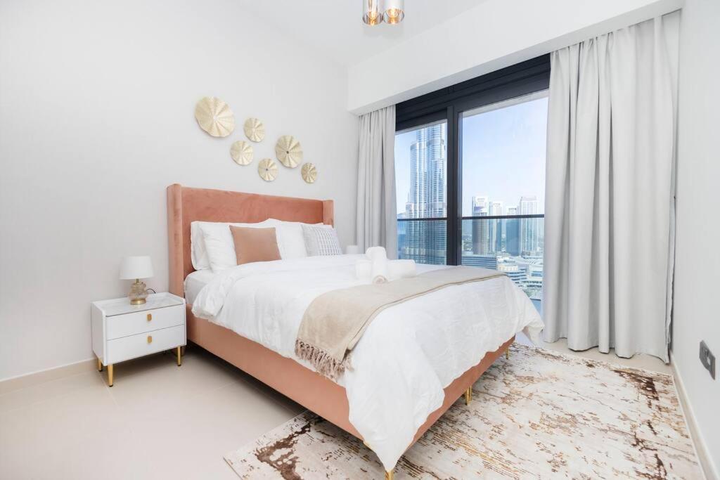 Elegant 4br, Stunning Burj Khalifa Views Act One 3001 Dubai