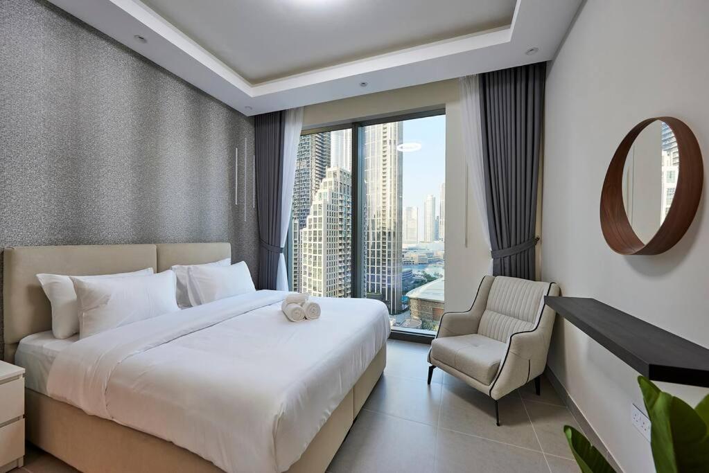 Apartment Tick - 4br Burj Khalifa Fountain Views 1 Dubai