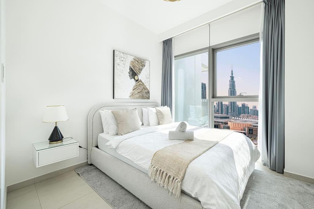 Maxstays - Stunning Burj Khalifa View - Mall Access - Infinity Pool *