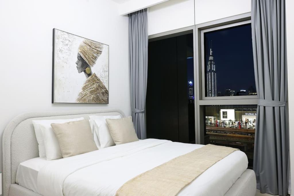 Maxstays - Stunning Burj Khalifa View - Mall Access - Infinity Pool