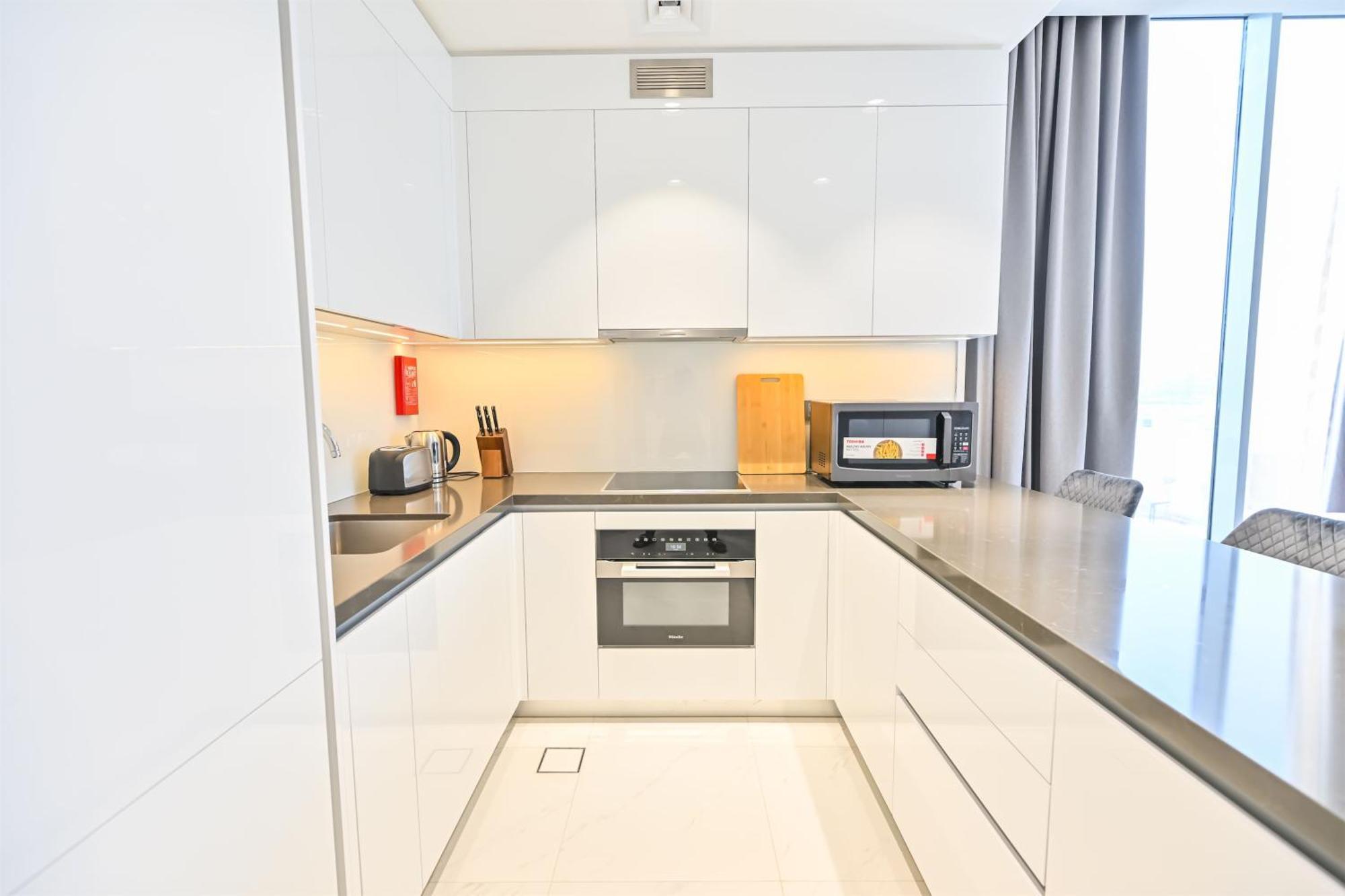Apartment Stylish 1br By The Lagoon In District One Meydan