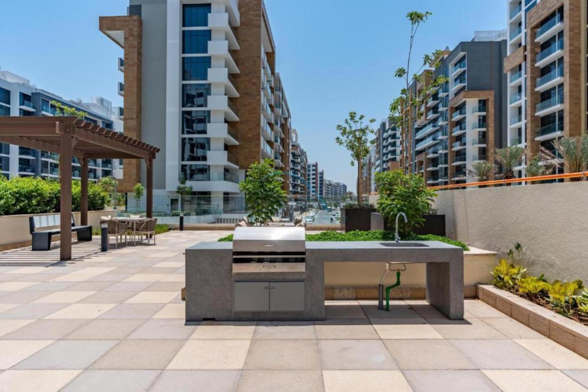 Community View With Balcony, Azizi Riviera 24, Al Merkadh By Deluxe Homes Apartment *