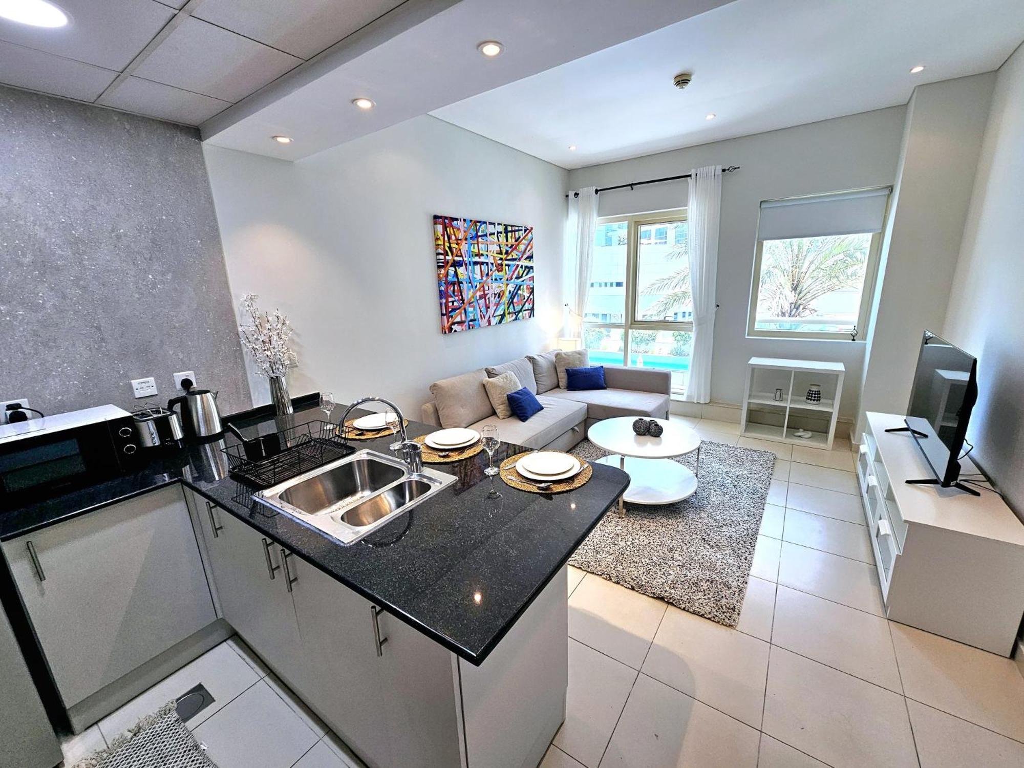 Apartment Sunrise Homes - Poolside 1 Bedroom Near Jbr Dubai