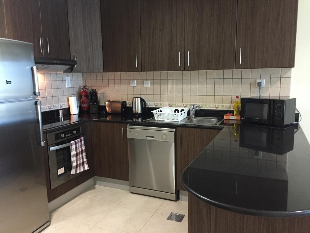 Espace Holiday Homes - Elite Residency Apartment *