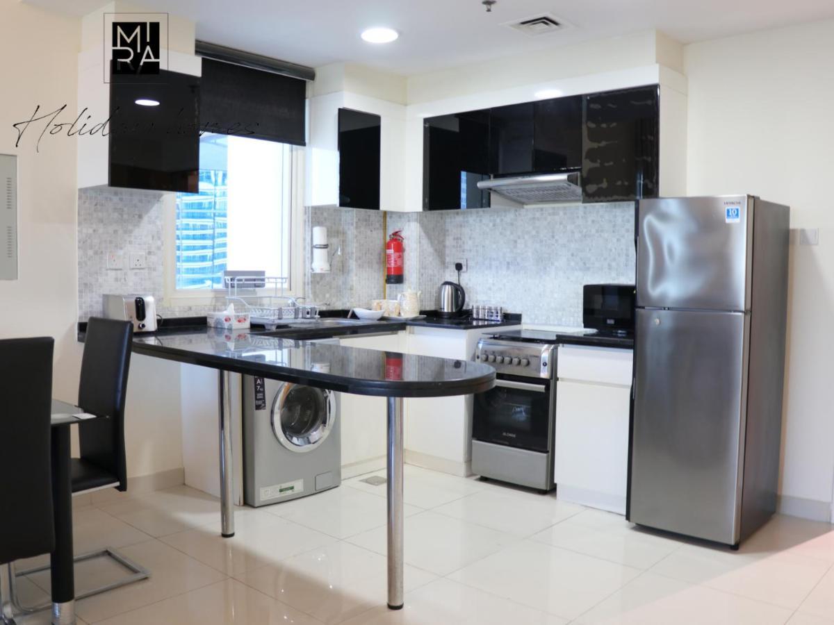 Mira Holiday Homes - Lovely 1 Bedroom In Business Bay With Free Parking Apartment *