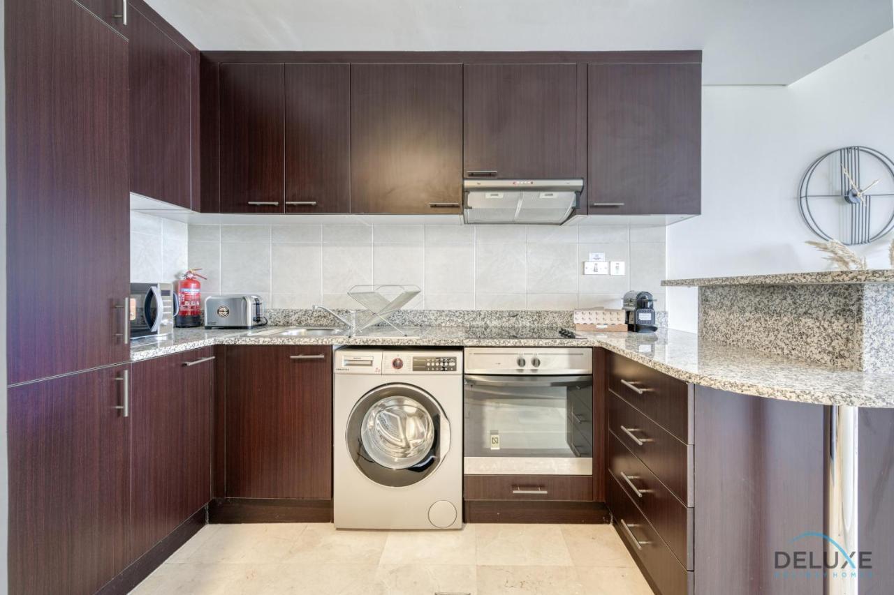 Apartment Affordable Luxury Modern 1br With Pool & Balcony By Deluxe Homes Dubai