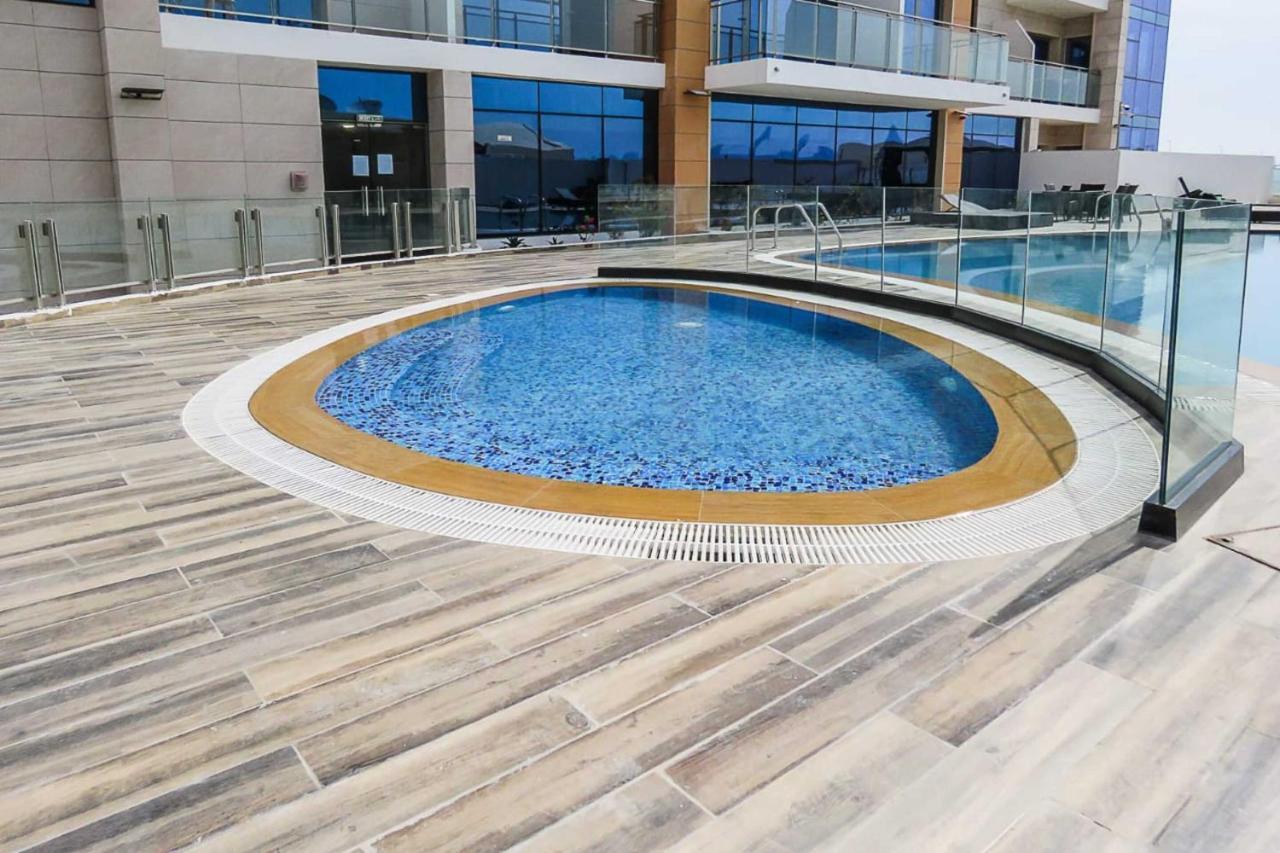 Oyo 860 Studio Apartment, Maya Tower 4, Jumeirah Village Triangle Guest house *