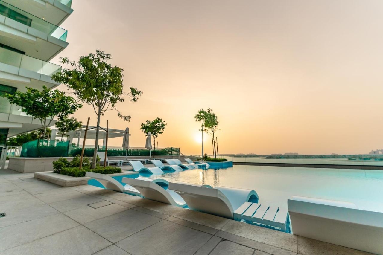 Apartment Fam Living - Beachfront Getaway In Emaar Beachfront - Private Access And Luxury Amenities