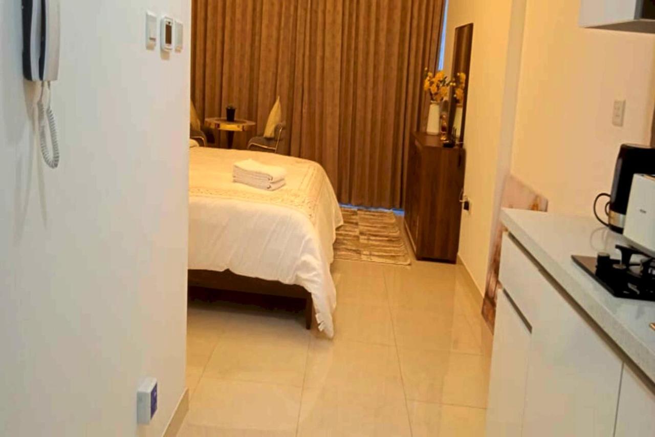 Oyo 990 Waves Tower Apartment