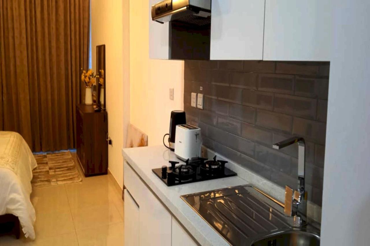 Oyo 990 Waves Tower Apartment Dubai