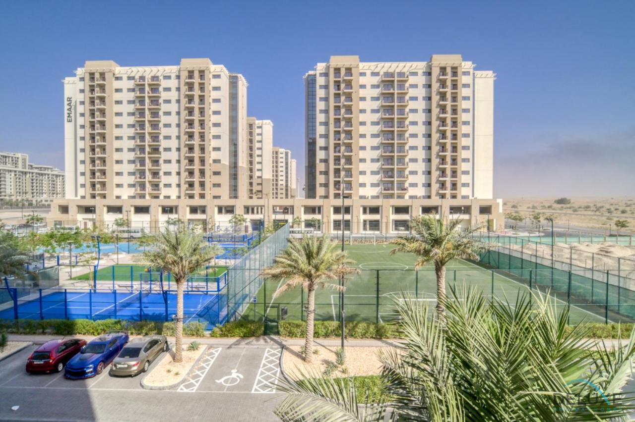 Apartment Sleek At Town Square Dubailand By Deluxe Homes *