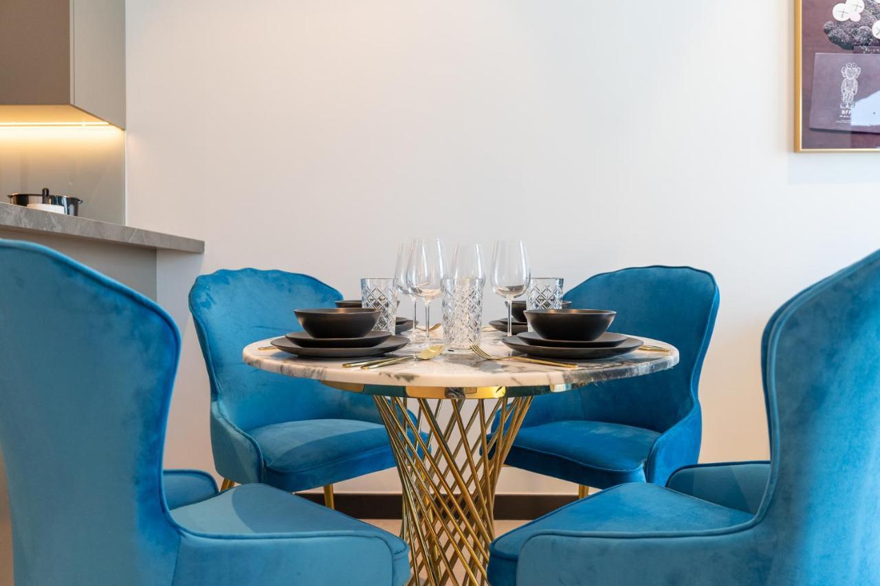 Azure Accents With Burj Khalifa View Apartment