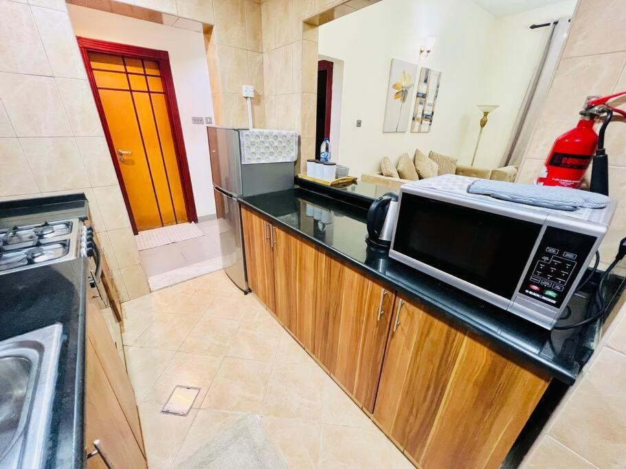 At Al Ghaimah Homes 1 Bedroom Near Airport Dubai