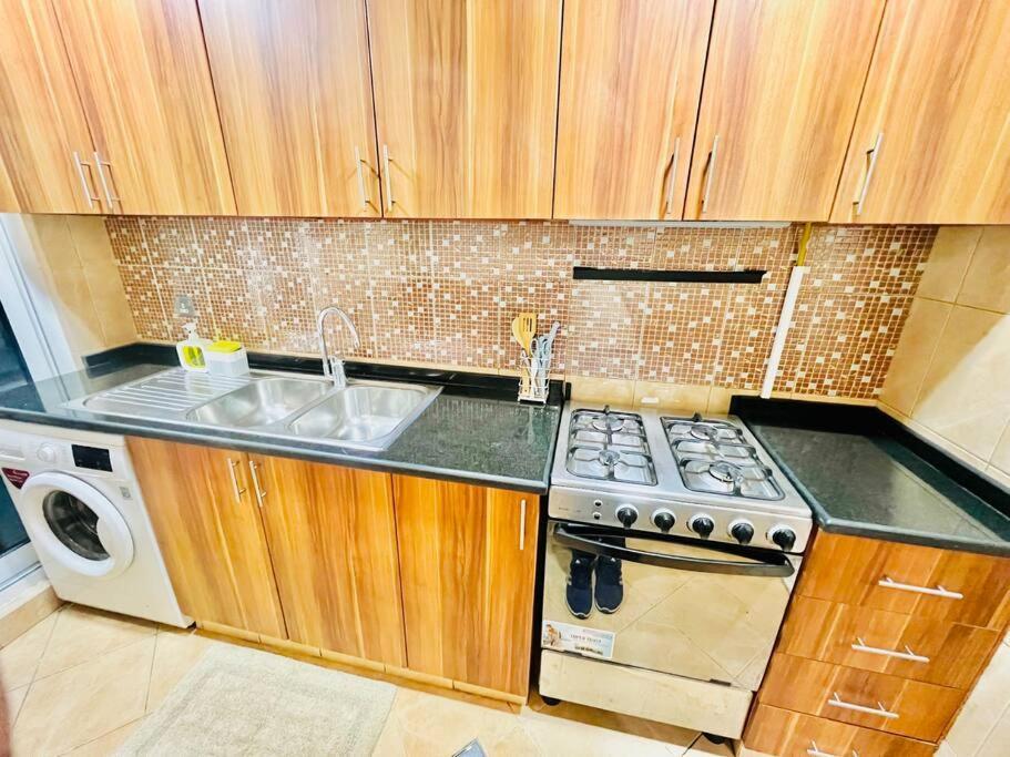 At Al Ghaimah Homes 1 Bedroom Near Airport * Dubai