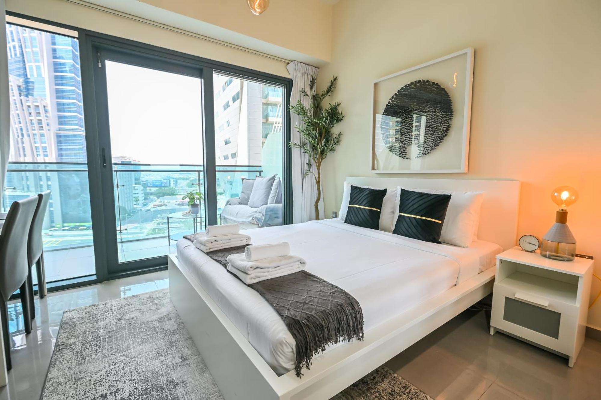Chic / Prime Business Bay Location / Spacious Balcony / New Building / Perfect For Solo Travelers, Busy Professionals, Couples Apartment *