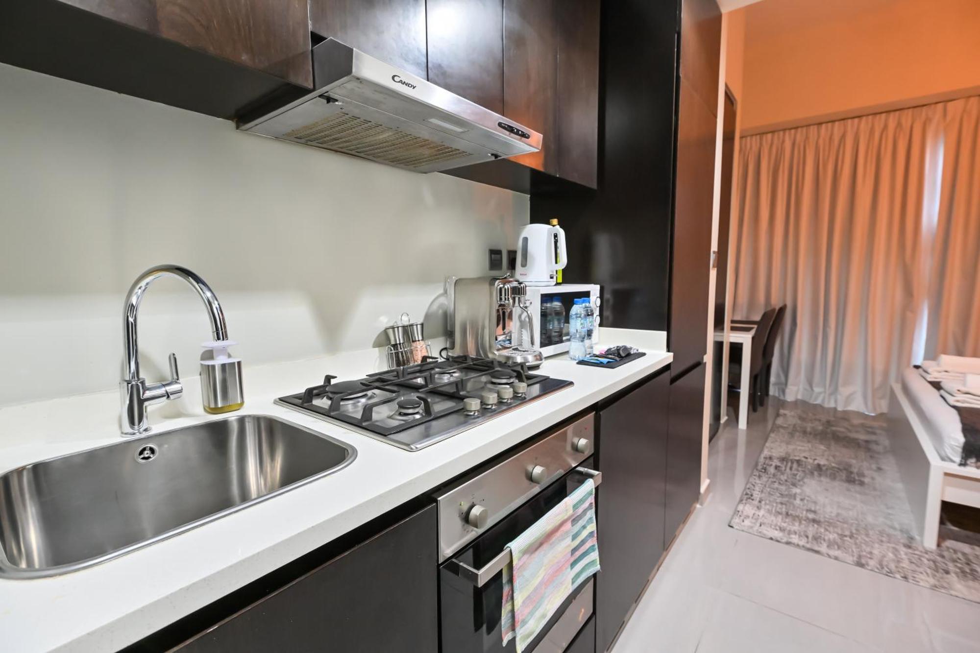 Chic / Prime Business Bay Location / Spacious Balcony / New Building / Perfect For Solo Travelers, Busy Professionals, Couples Apartment *