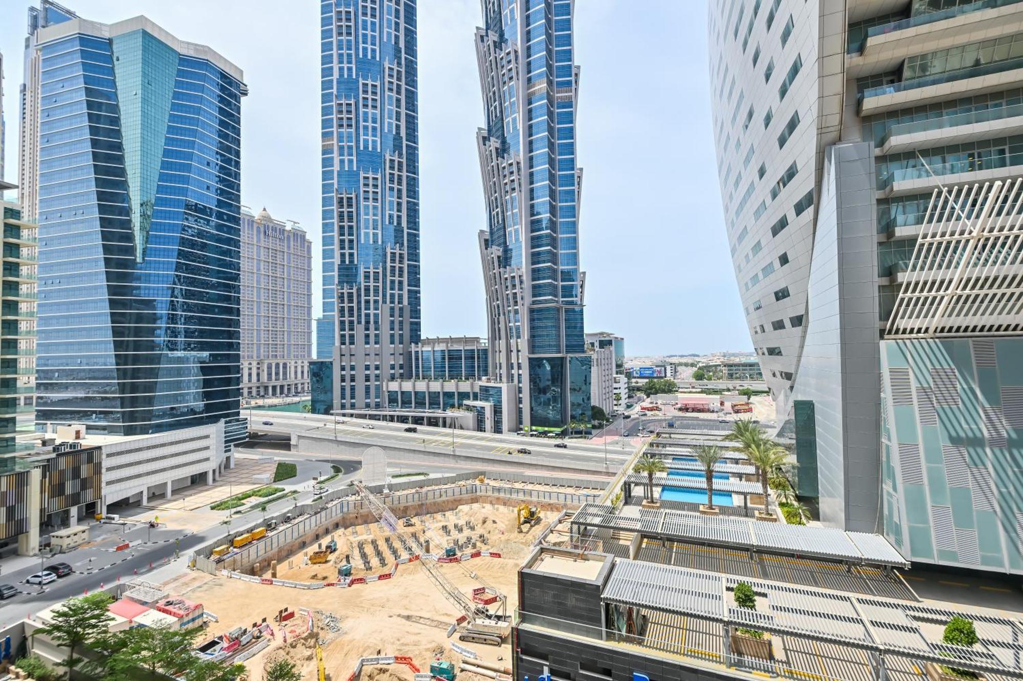 Chic / Prime Business Bay Location / Spacious Balcony / New Building / Perfect For Solo Travelers, Busy Professionals, Couples Apartment Dubai