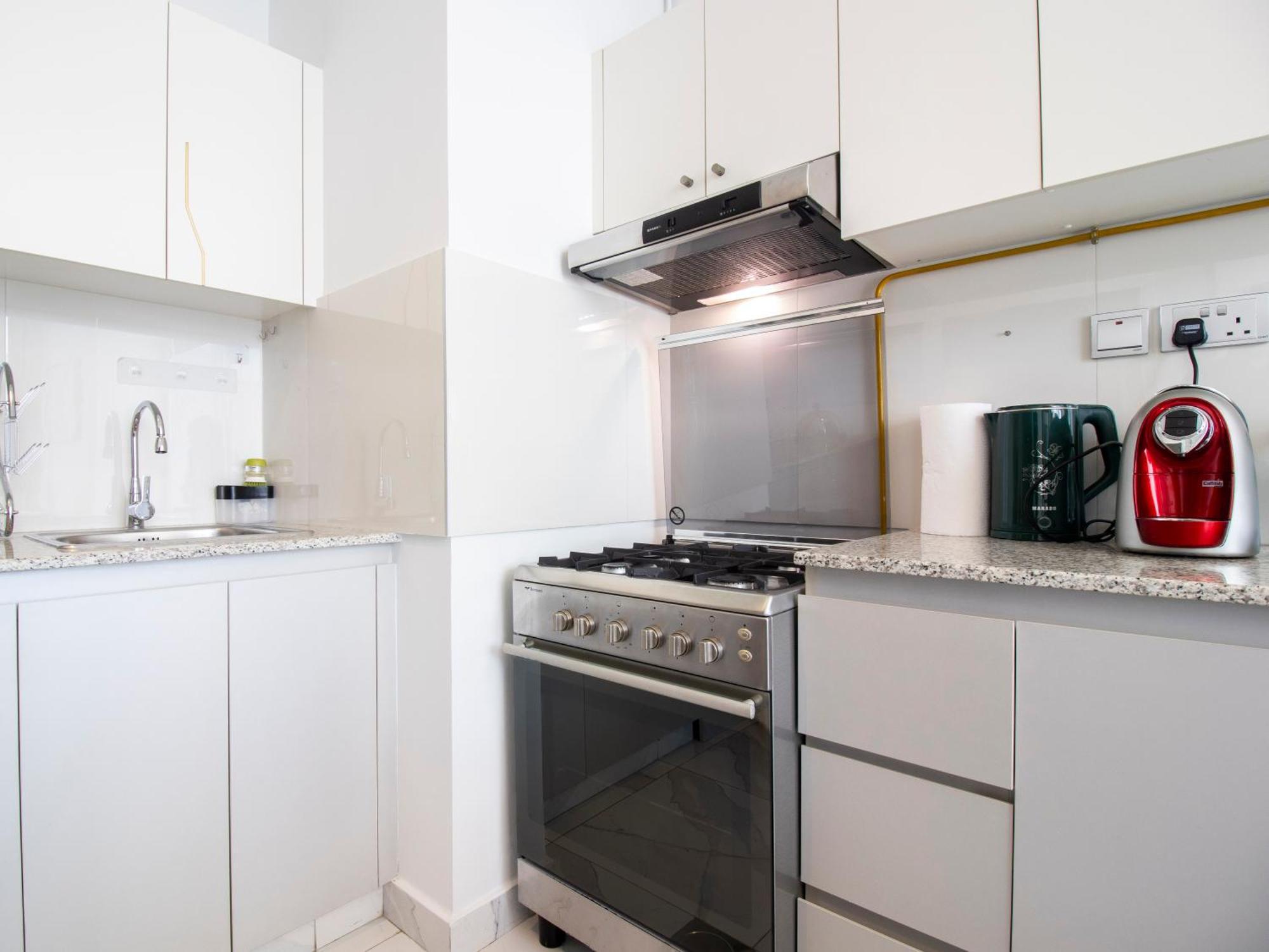 Elegant 2br Ensuite With Canal & Burj Khalifa View *