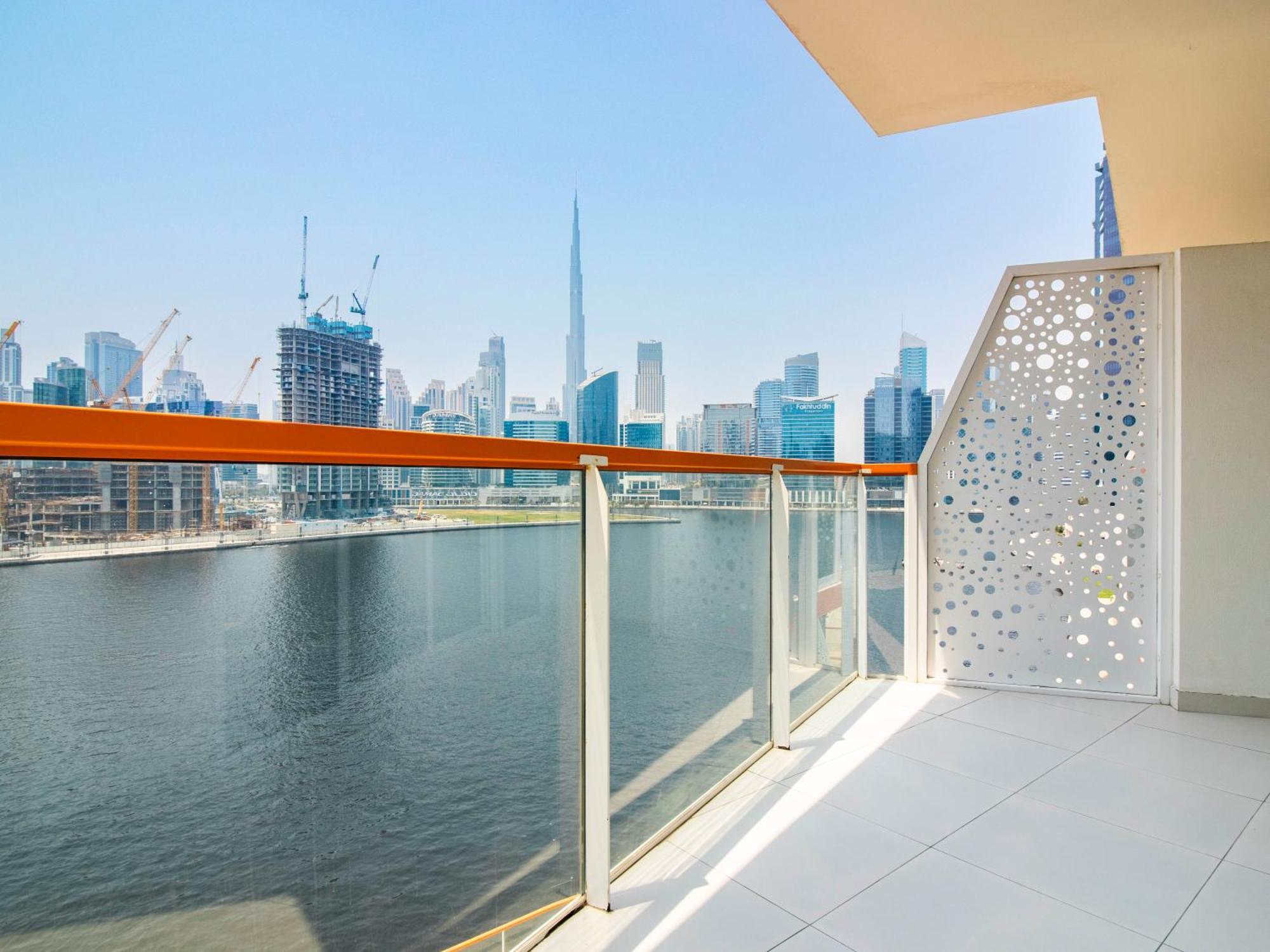 Elegant 2br Ensuite With Canal & Burj Khalifa View Apartment