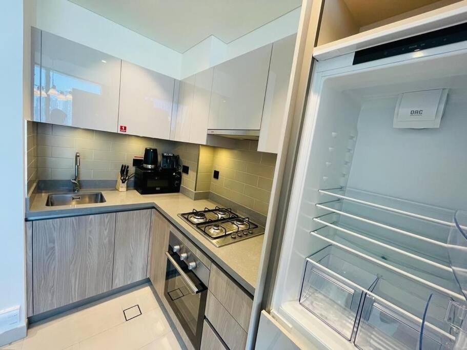 Burj Khalifa Skyline View Sobha Waves - Sobha Hartland Apartment
