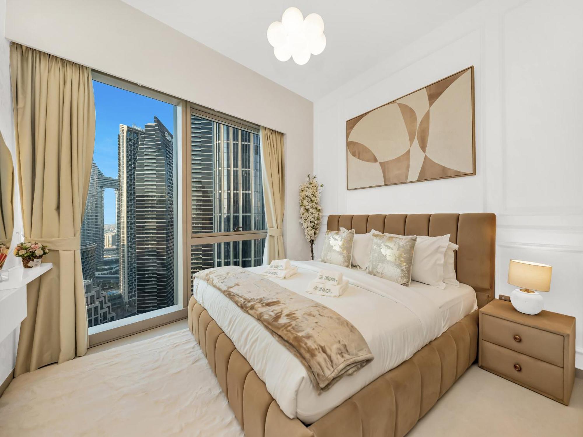 Grandeur 2 Bedroom I Burj Khalifa & Fountain Views I Free Parking, Gym, Pool, Wi-fi & Ps5 I By Skyline Serenity Dubai