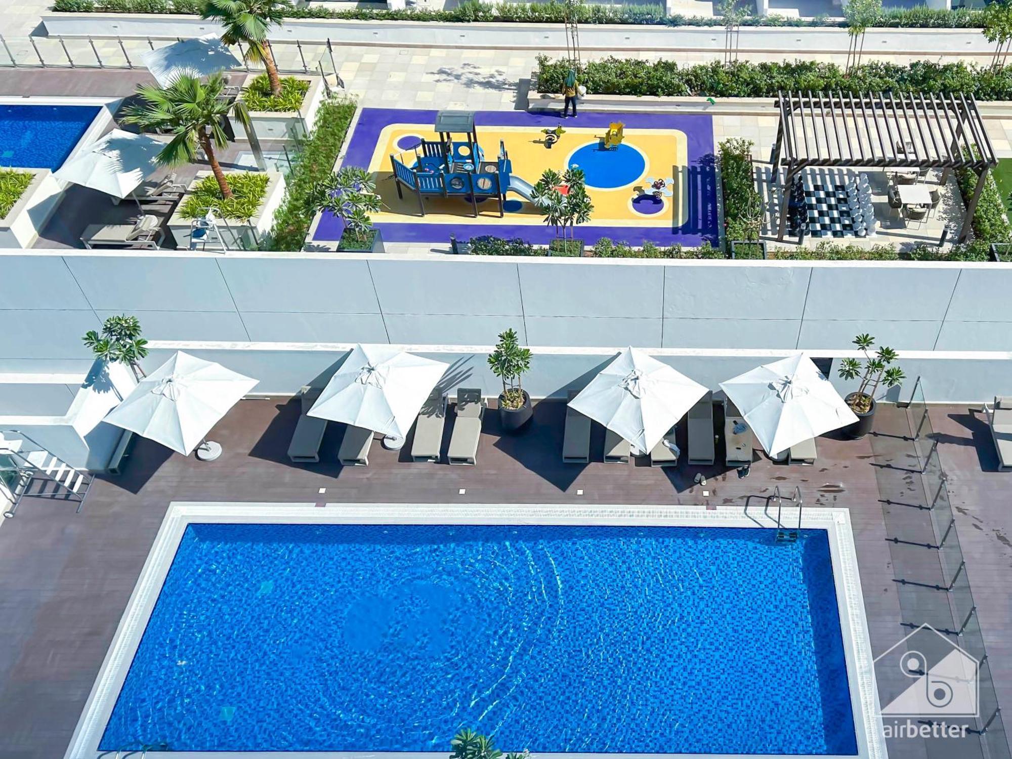 Deluxe With Balcony At Aziz Riviera Apartment Dubai