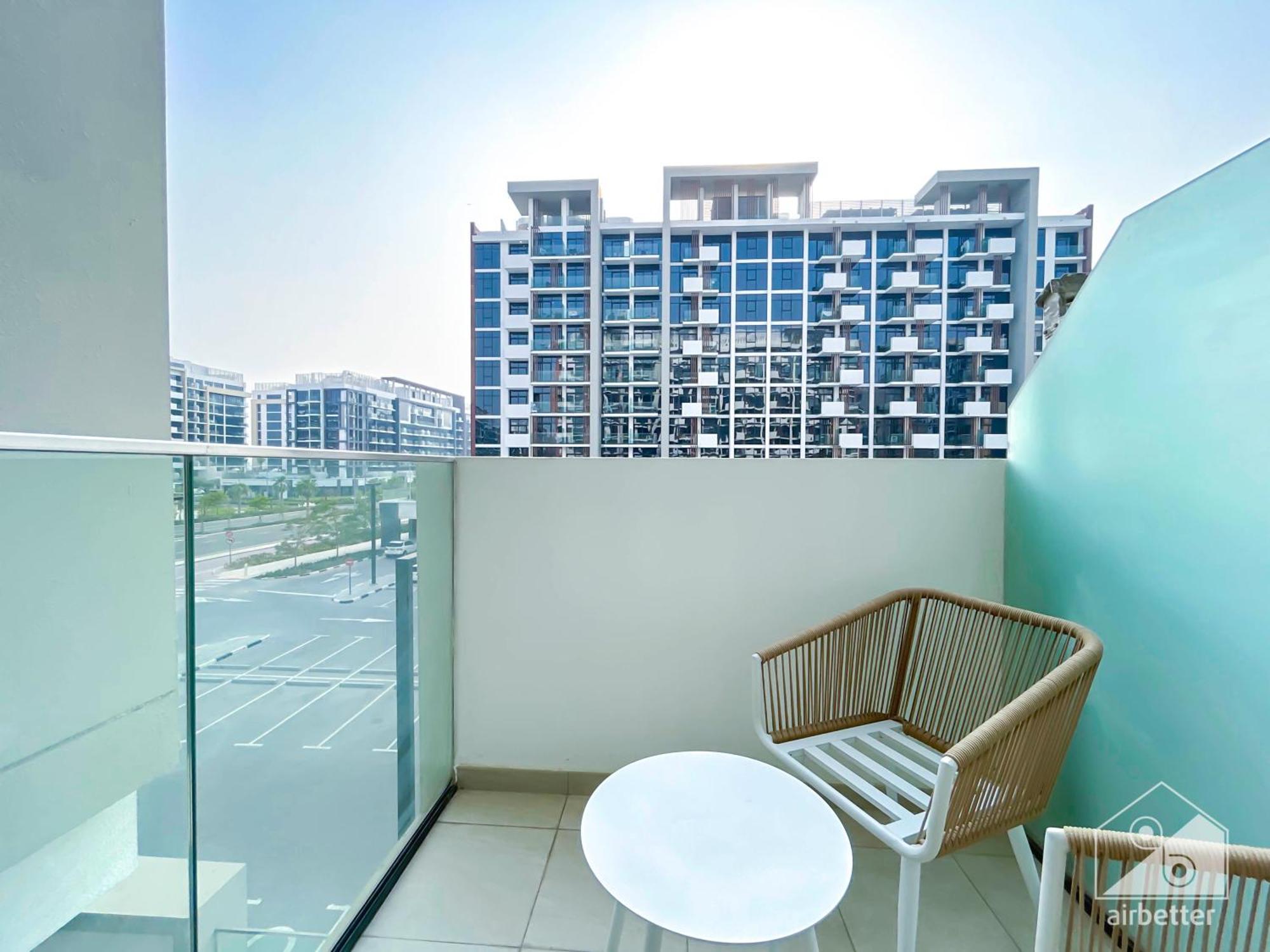 Deluxe With Balcony At Aziz Riviera Apartment Dubai