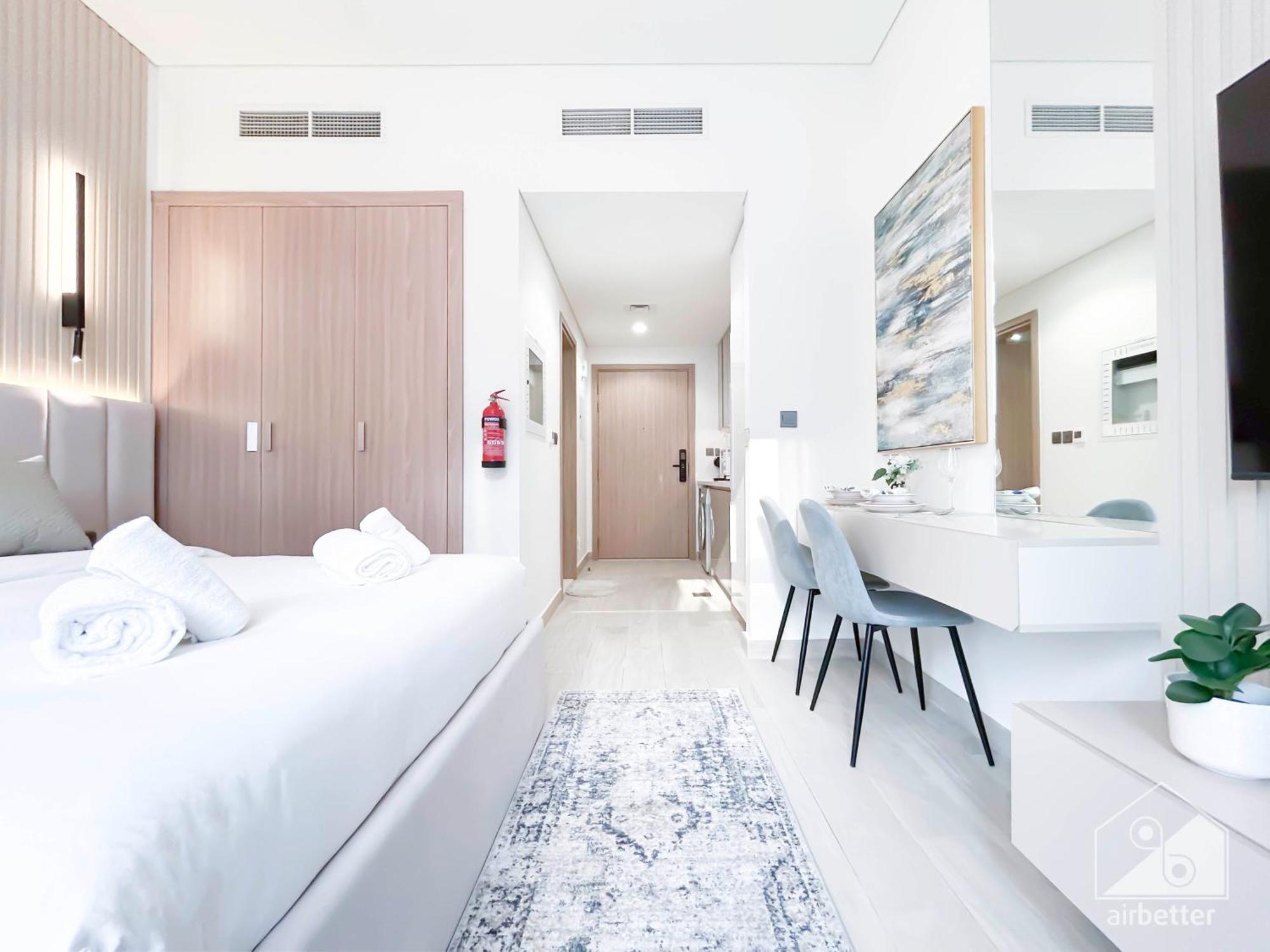 Deluxe With Balcony At Aziz Riviera Apartment Dubai