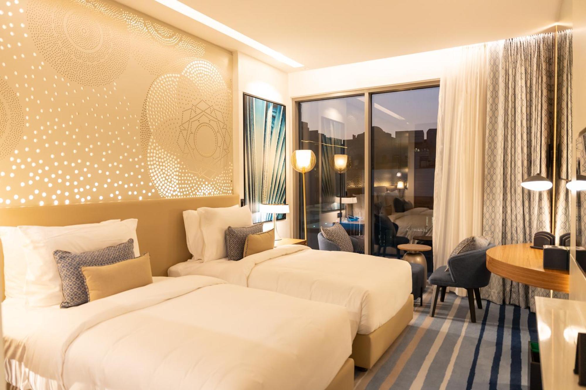 Tumbi West Palm Dubai,tapestry Collection Hilton 4*