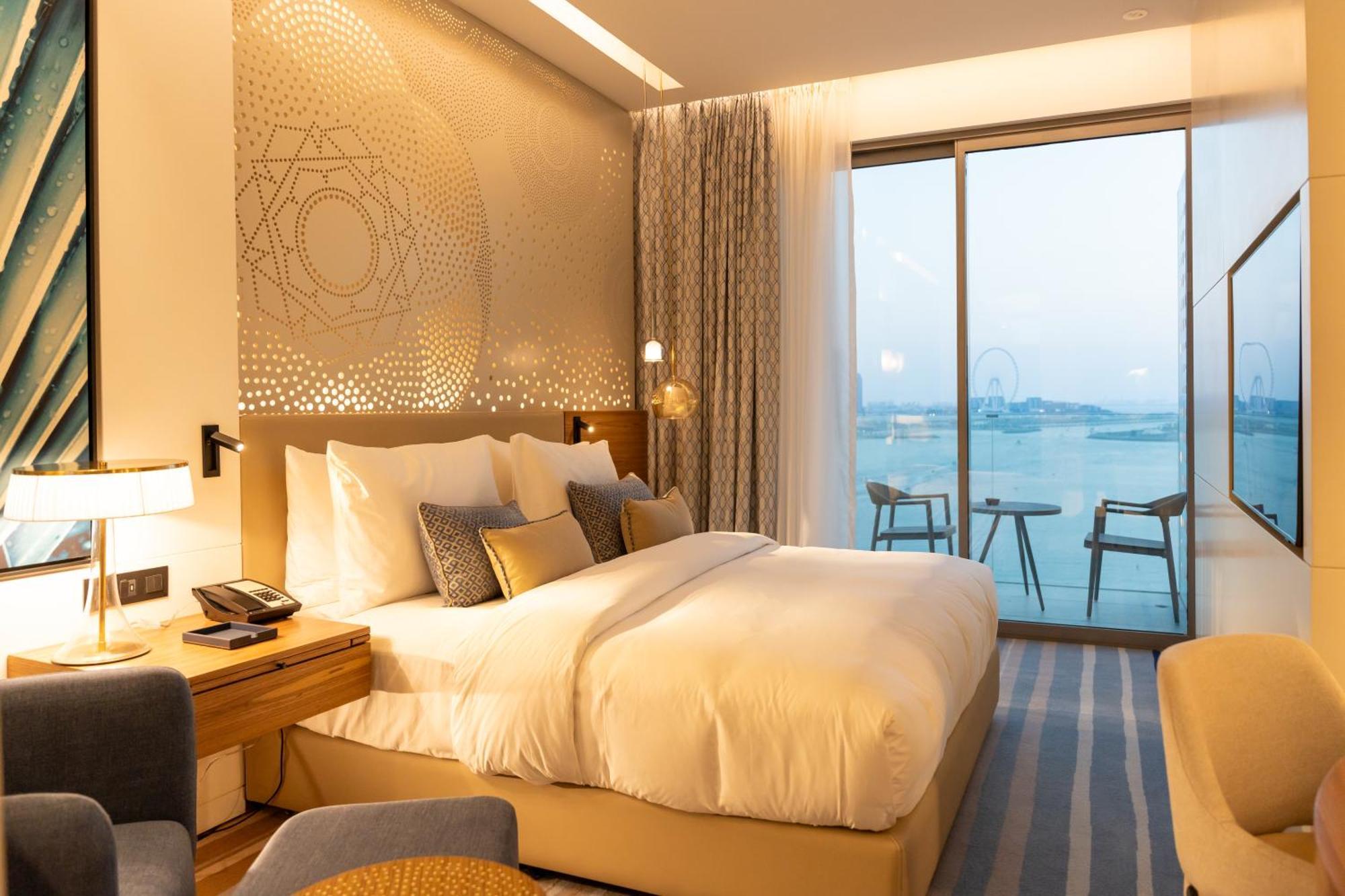 Tumbi West Palm Dubai,tapestry Collection Hilton