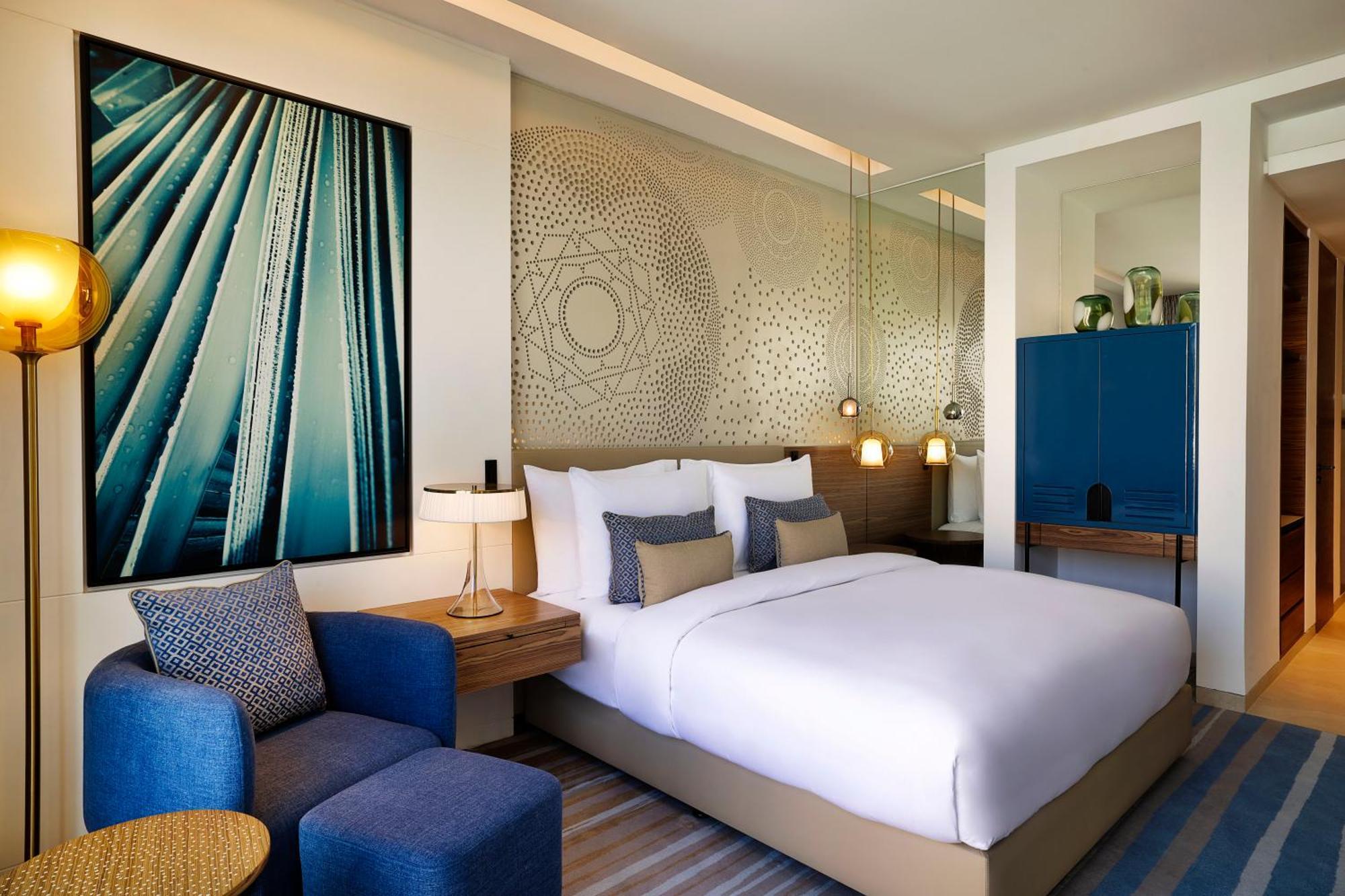 Tumbi West Palm Dubai,tapestry Collection Hilton