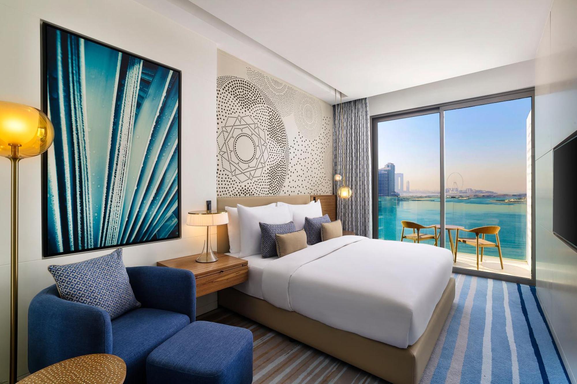 Tumbi West Palm Dubai,tapestry Collection Hilton Hotel