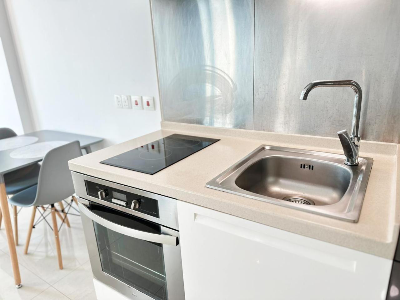 Sleek And Stylish - Modern In The Heart Of By Petals Homes Apartment *