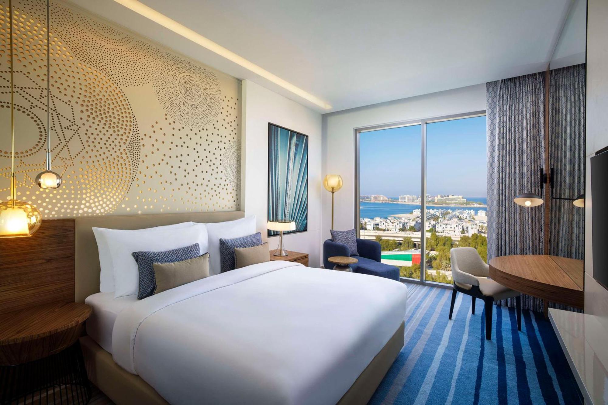 Tumbi West Palm Dubai,tapestry Collection Hilton Hotel