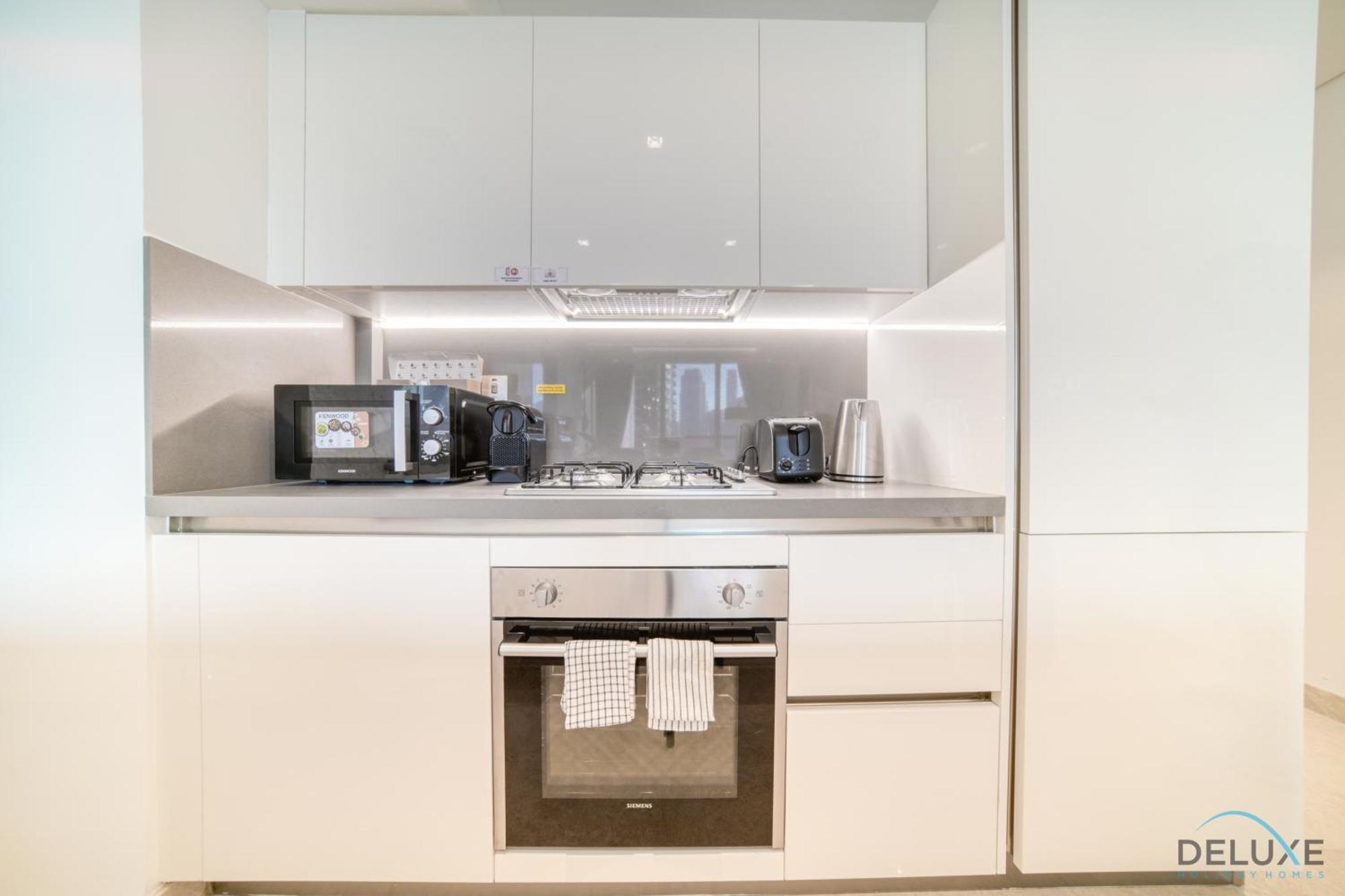 Exclusive Offer Cozy With Burj Khalifa Views By Deluxe Homes Dubai