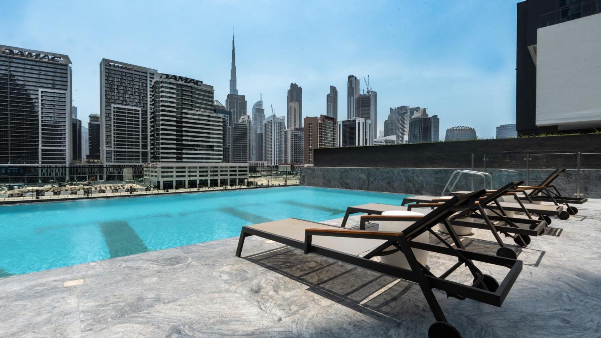 Keyrock Living - Binghatti Canal Luxury Haven *