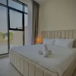 Serene Green Escape And Stunning Views In Damac Hills 1 By Bhavan Vacation Homes