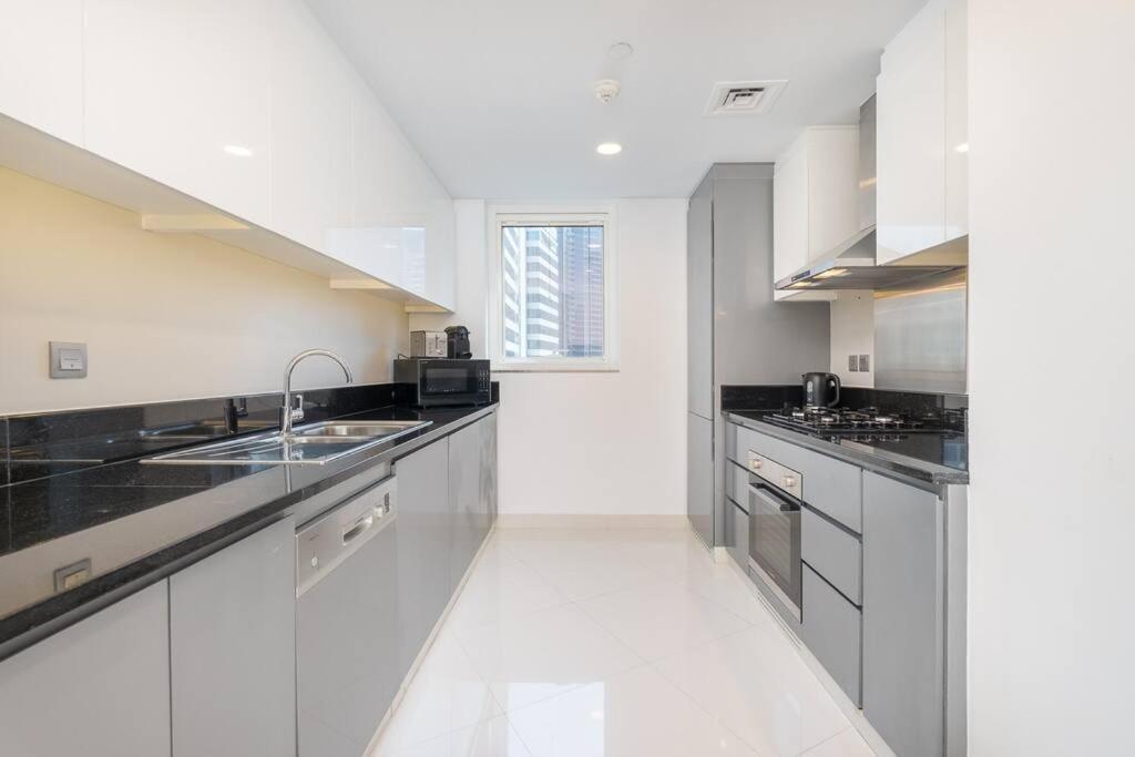 Sophisticated Business Bay Canal View By Suiteable Apartment