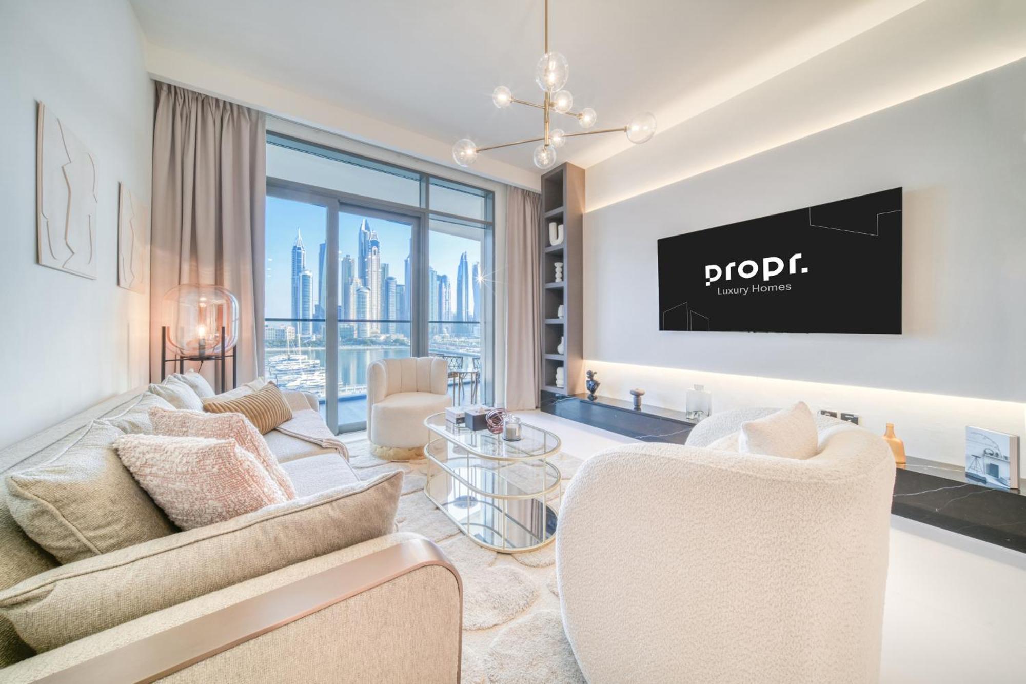 Seaside Splendor: Luxe Retreat At Emaar Beachfront *