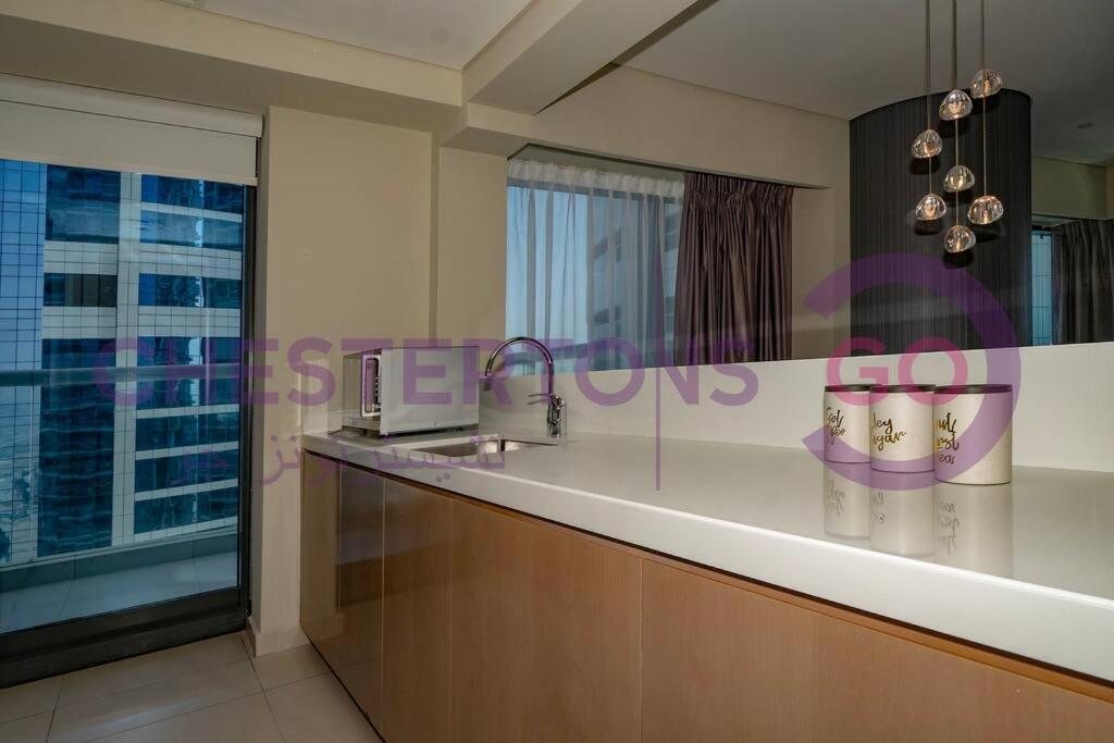 Chestertons Go - Damac Paramount Towers - Business Bay * Dubai