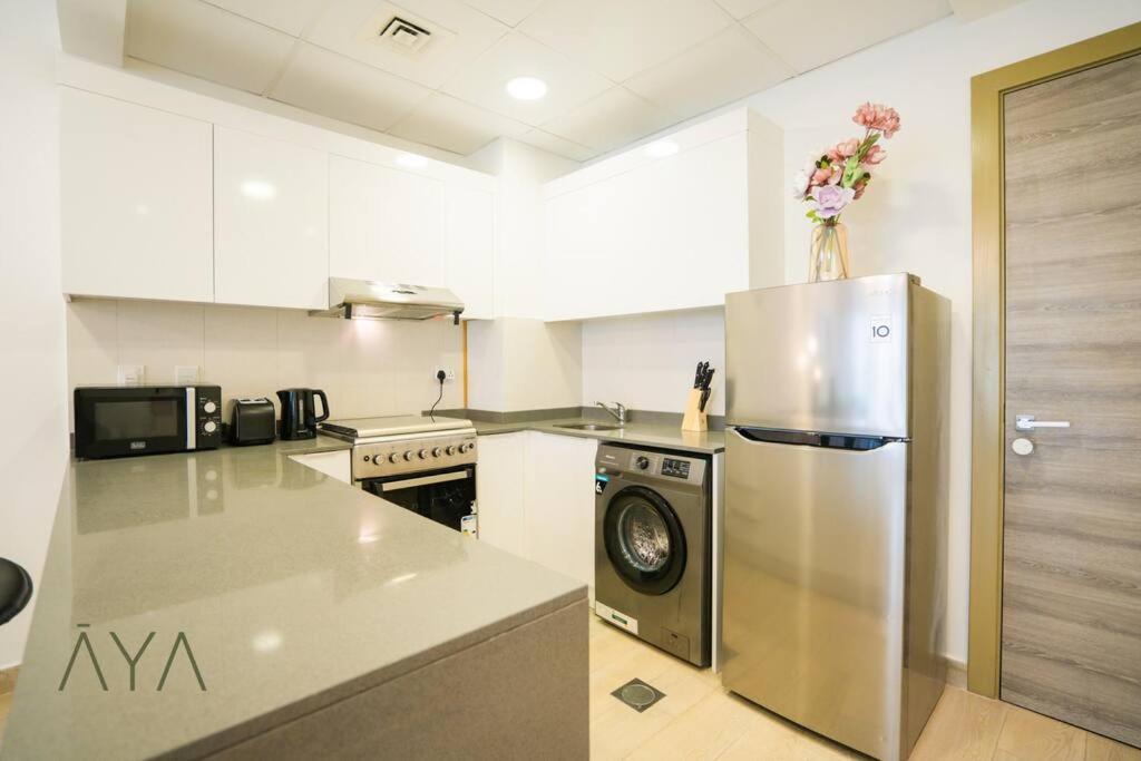 Elegant 1br Retreat With Rooftop Pool In Jvc *